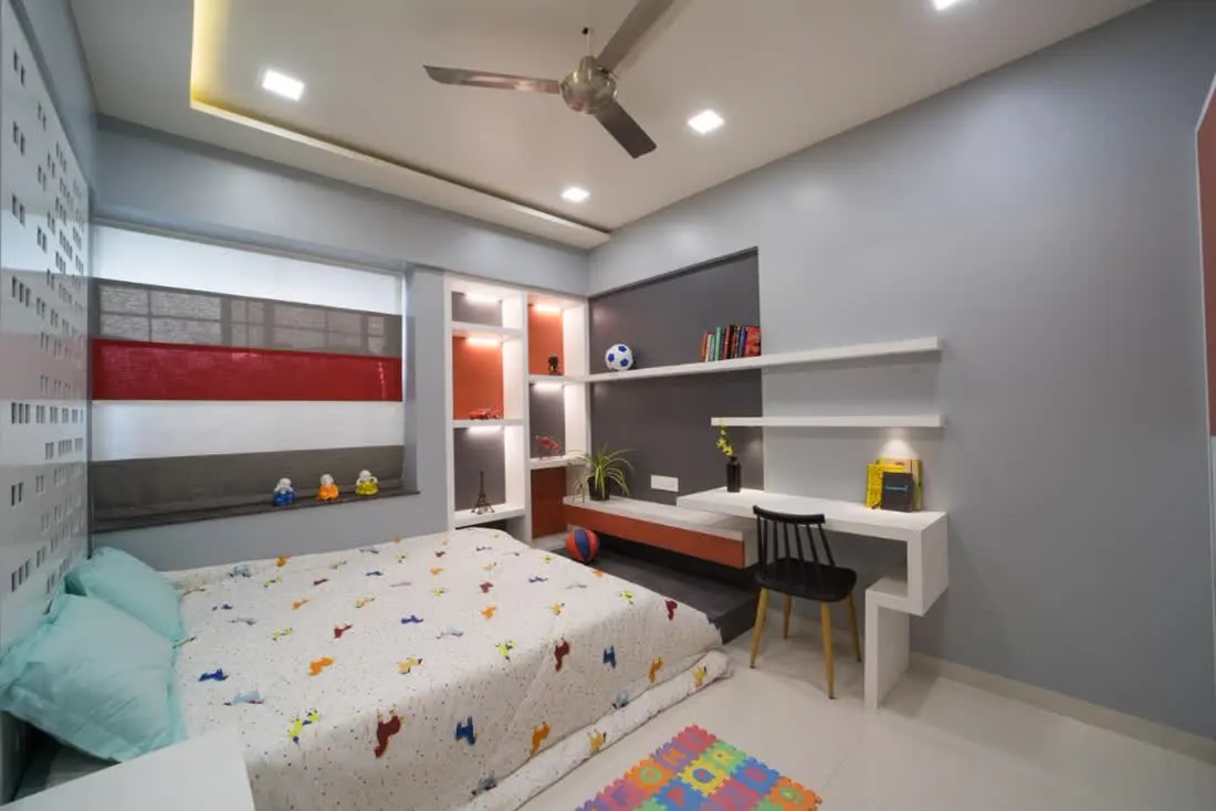 Kids bedroom with study desk and display shelving